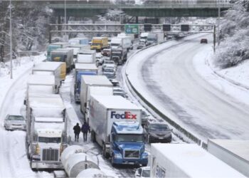 Hundreds are without power as storms in California deliver cold, rain, and snow.